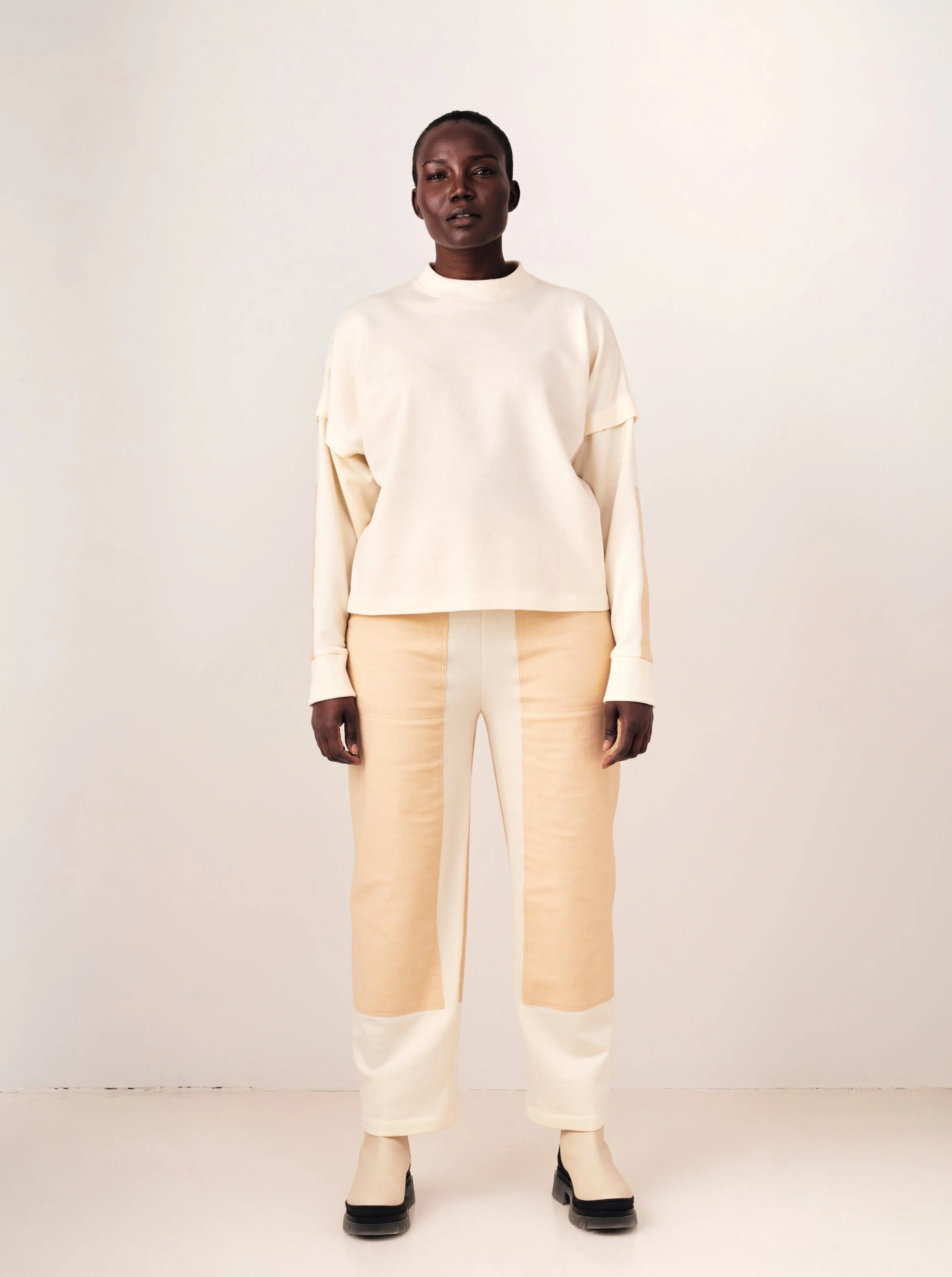 OKINI beige pant sold by Odeyalo