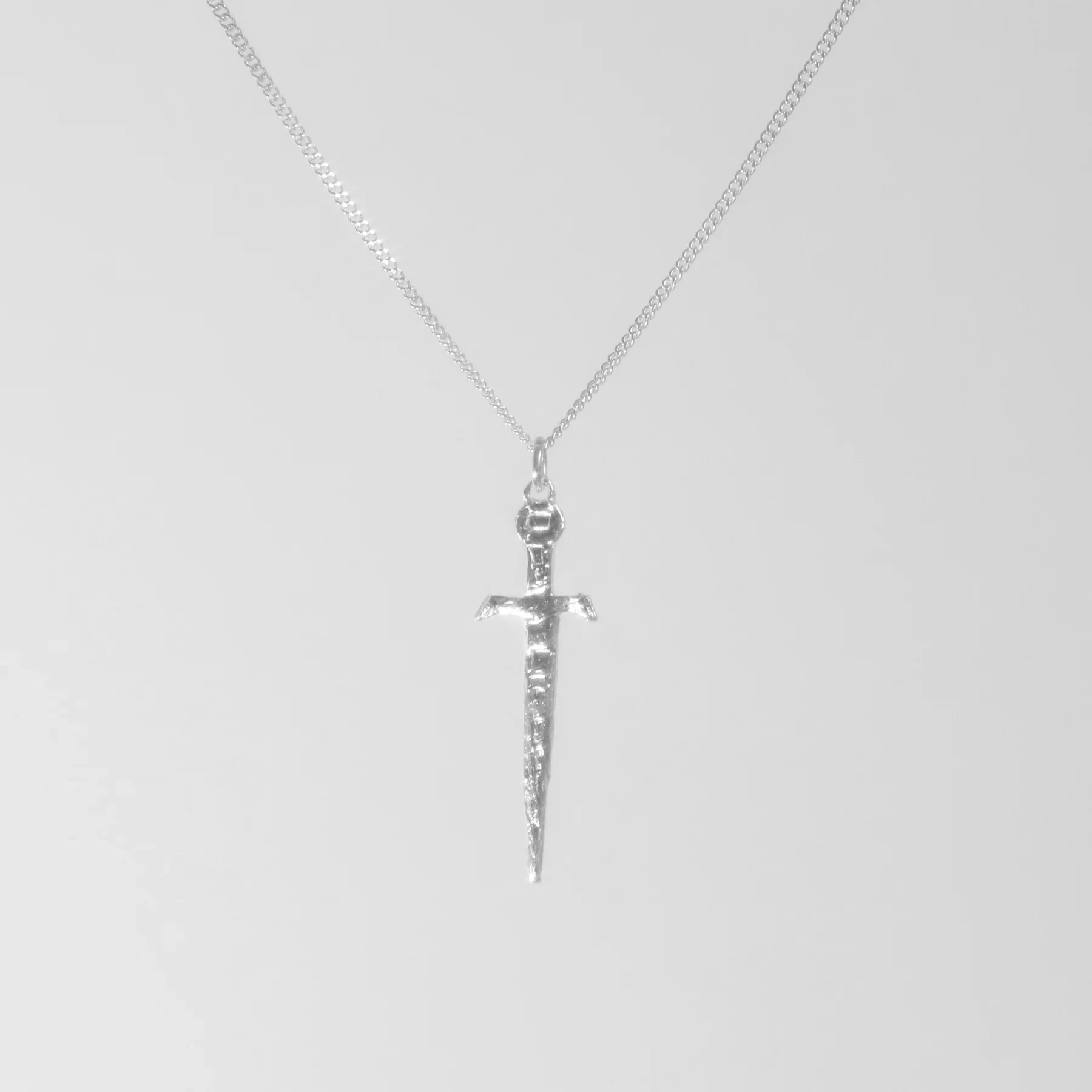 BILAK - Dagger Charm Necklace sold by Odeyalo