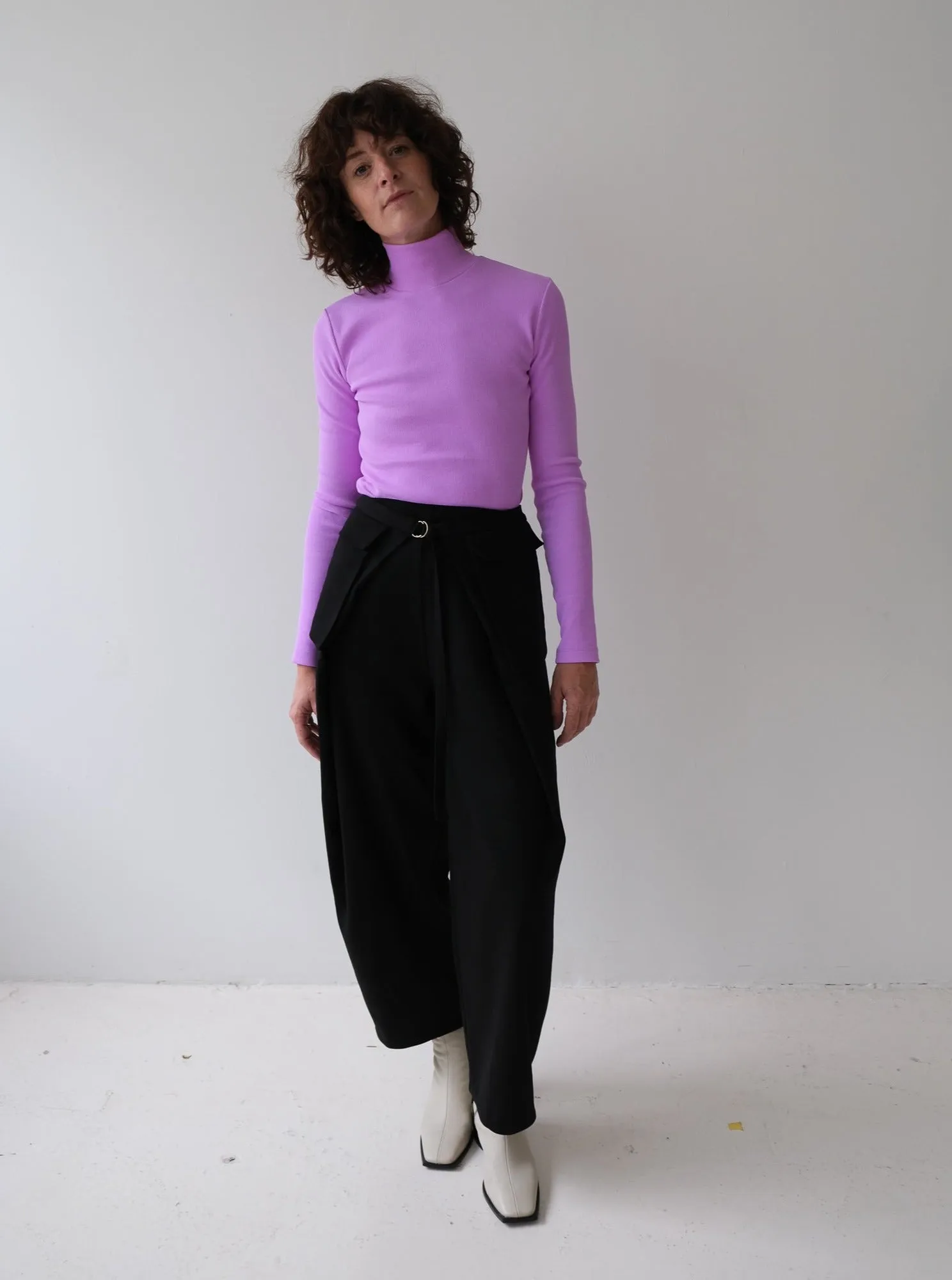DAX black wool pant sold by Odeyalo