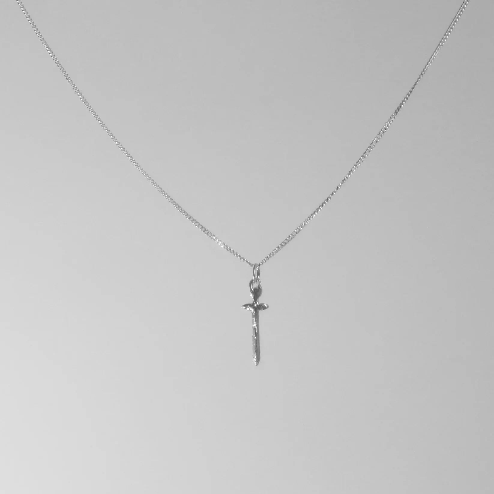 BILAK - Mini Sword Charm Necklace sold by Odeyalo