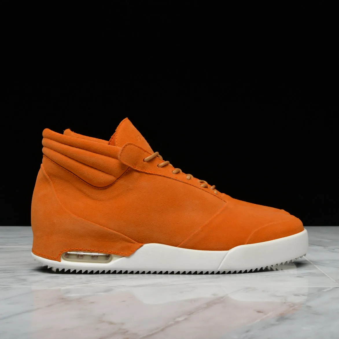 001 BY JOHN GEIGER - CLAW/BURNT ORANGE sold by Lapstone & Hammer