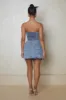 The Denim asymmetric skirt- Dark wash sold by MARS THE LABEL