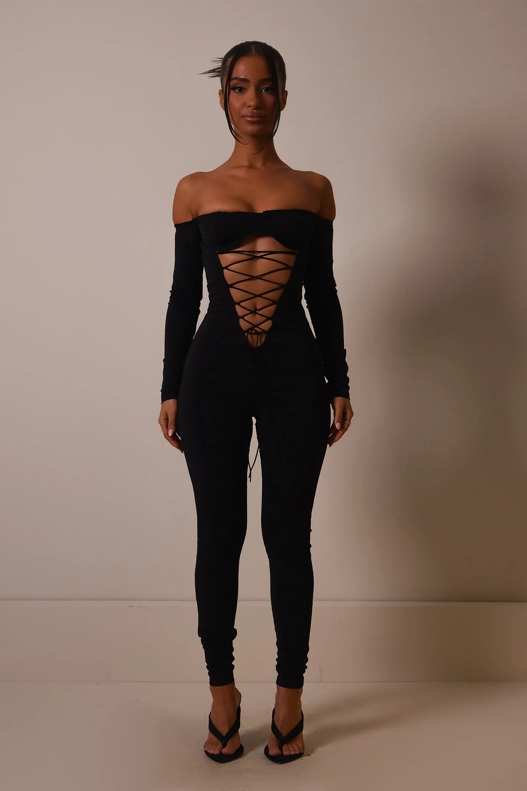 The Cut out lace up jumpsuit- Black sold by MARS THE LABEL