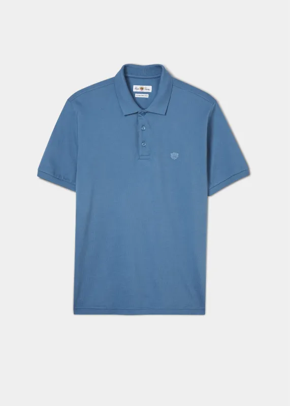 Fritton Pique Polo Shirt In Mid Blue sold by Alan Paine