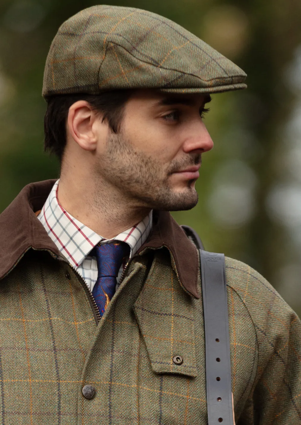 Rutland Men's Tweed Flat Cap In Dark Moss sold by Alan Paine product image thumbnail 2