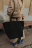 Sprout Tote Black Suede sold by Little Liffner