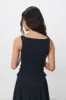 The Deba Top, Navy sold by Peachy Den