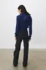 The Bellatrix Hooded Cardigan, Navy sold by Peachy Den