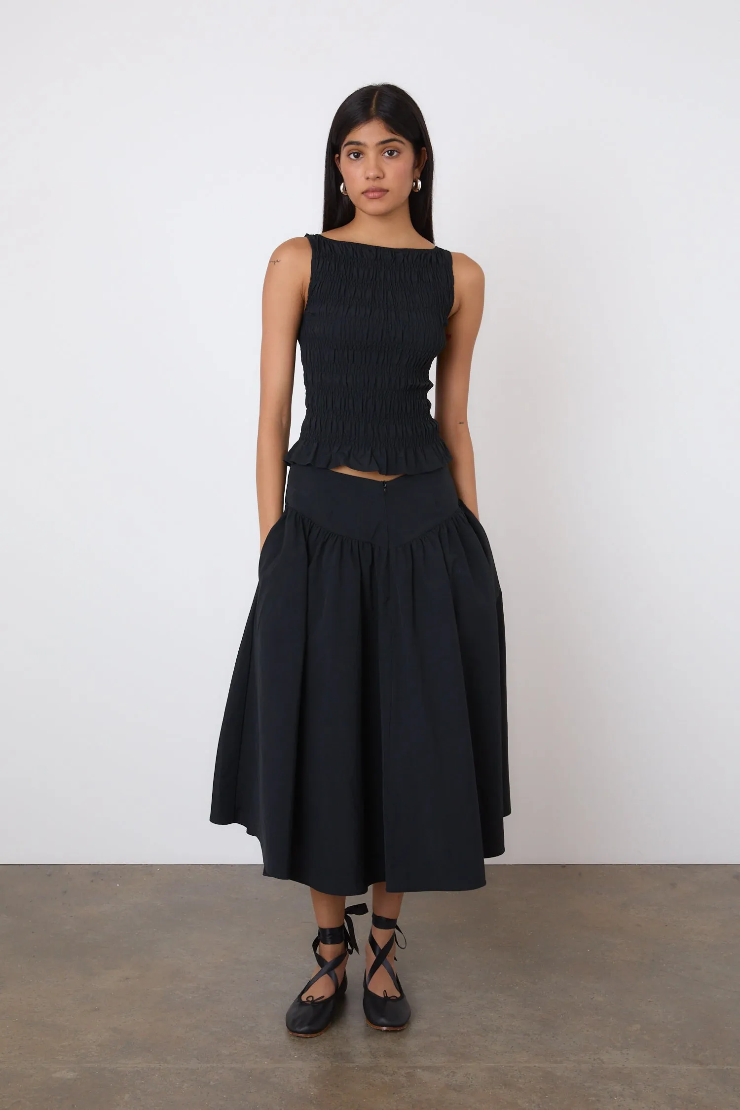 The Deba Midi Skirt, Onyx sold by Peachy Den