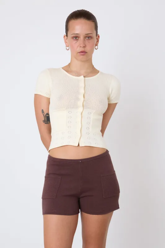 The Marie Knit Polo Top, Cream sold by Peachy Den
