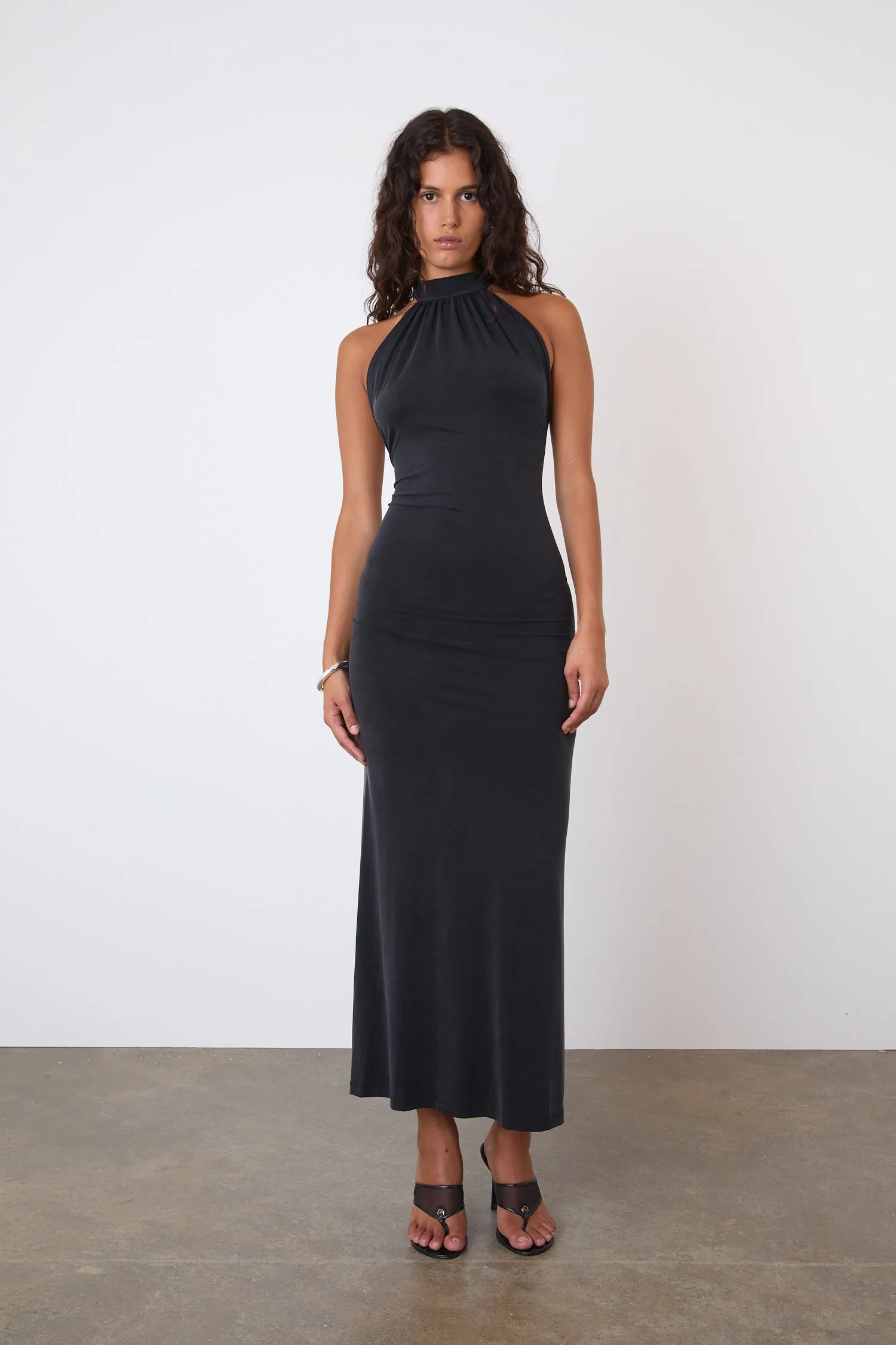 The Kylie Halter Maxi Dress, Graphite sold by Peachy Den