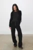 The Bellatrix Hooded Cardigan, Black sold by Peachy Den