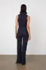 The Barbi Jumpsuit, Indigo sold by Peachy Den