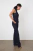 The Barbi Jumpsuit, Indigo sold by Peachy Den