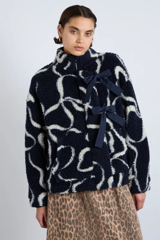 ingrid borg jacket- navy bows sold by Damson Madder