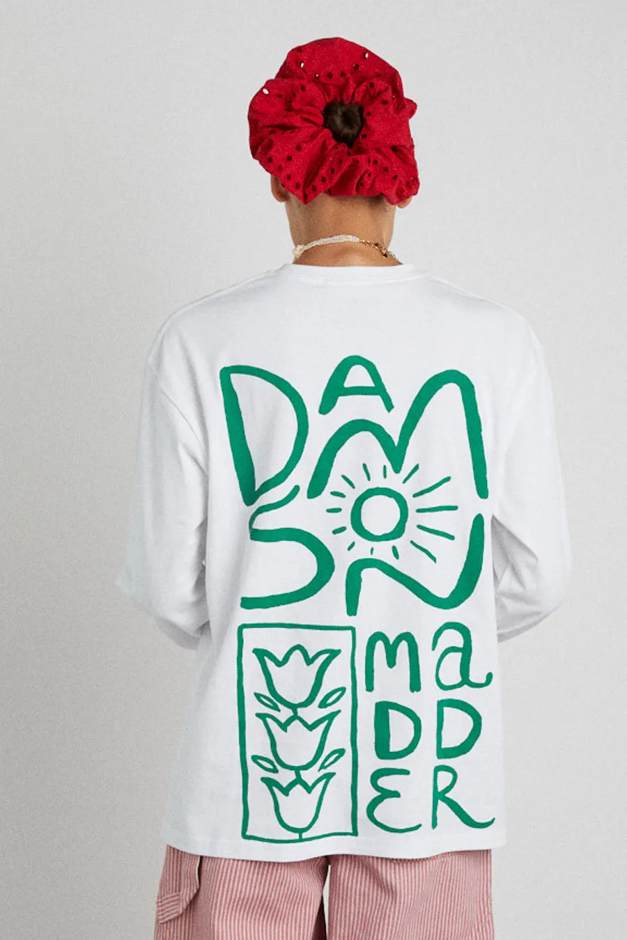 green logo long sleeve tee sold by Damson Madder