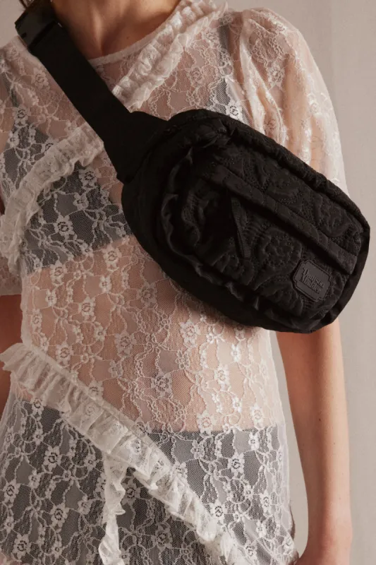 frill cross body bag in black floral stitch sold by Damson Madder