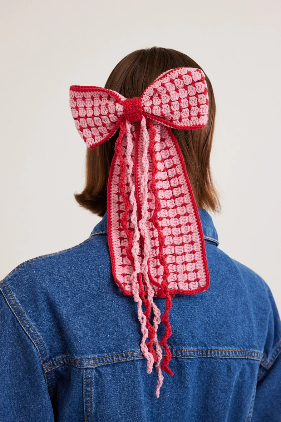 oversized crochet hair bow sold by Damson Madder