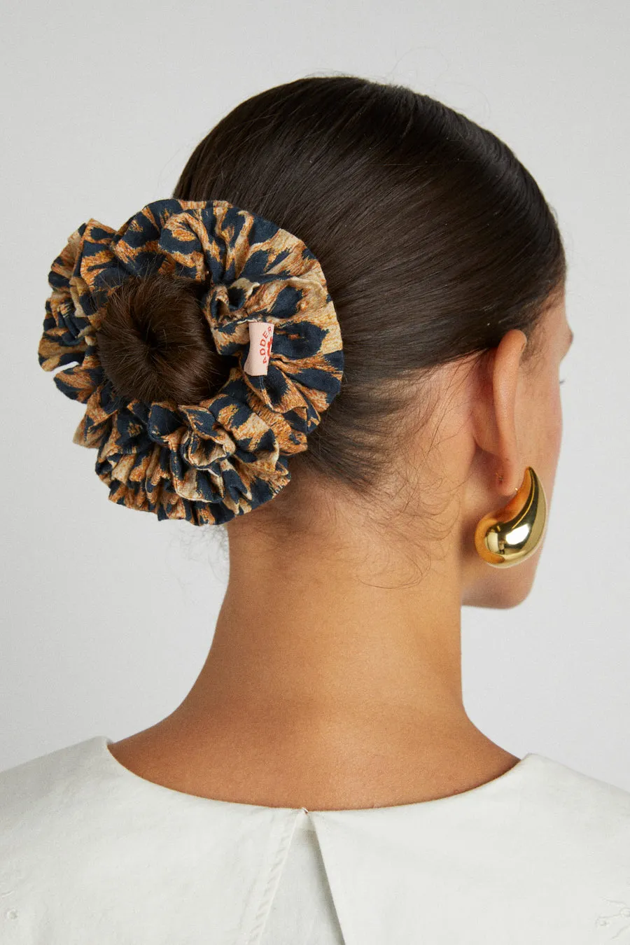 shirred garter scrunchie in leopard sold by Damson Madder