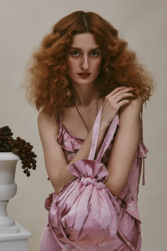 satin pouch bag with bow embroidery sold by Damson Madder