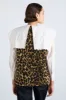 marta borg gilet - leopard sold by Damson Madder