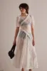 leila white flower lace dress sold by Damson Madder
