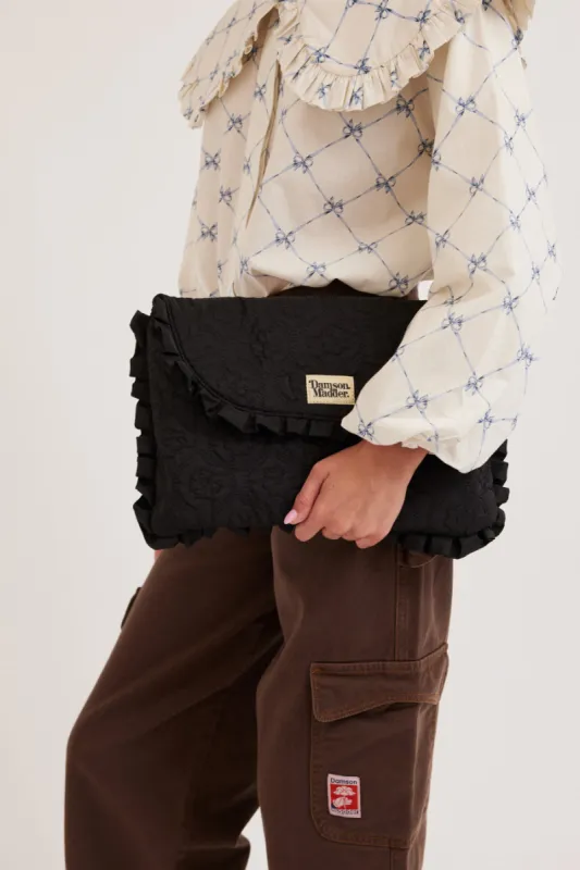 frill laptop bag in black floral stitch sold by Damson Madder