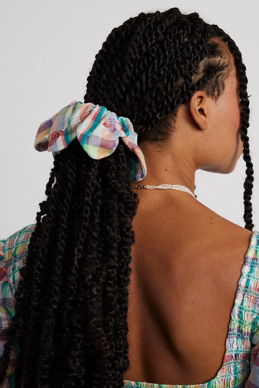 flower scrunchie in check sold by Damson Madder