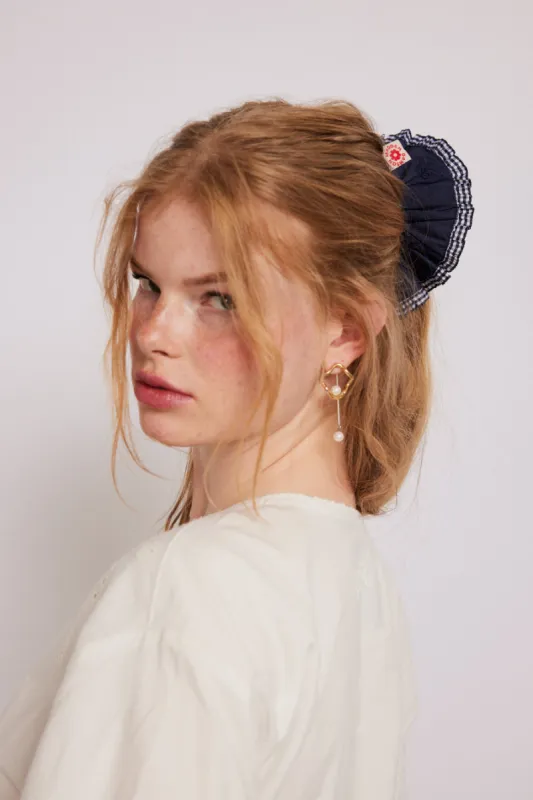 frill scrunchie in navy with gingham edge sold by Damson Madder