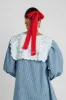 knitted hair bow sold by Damson Madder