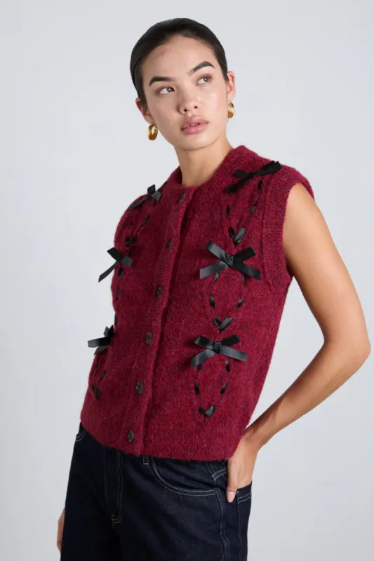 aggie knit vest with bows- burgundy cable sold by Damson Madder