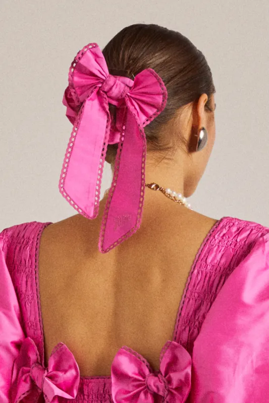 pink taffetta bow scrunchie sold by Damson Madder