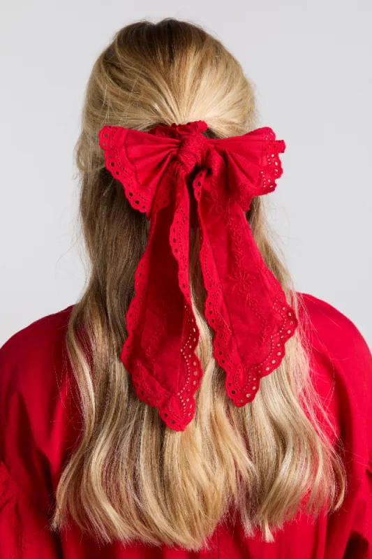 embroidered bow scruchie in red sold by Damson Madder