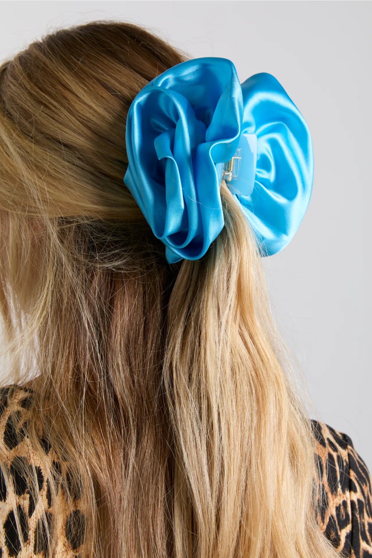 oversized satin rose hairclip in blue sold by Damson Madder