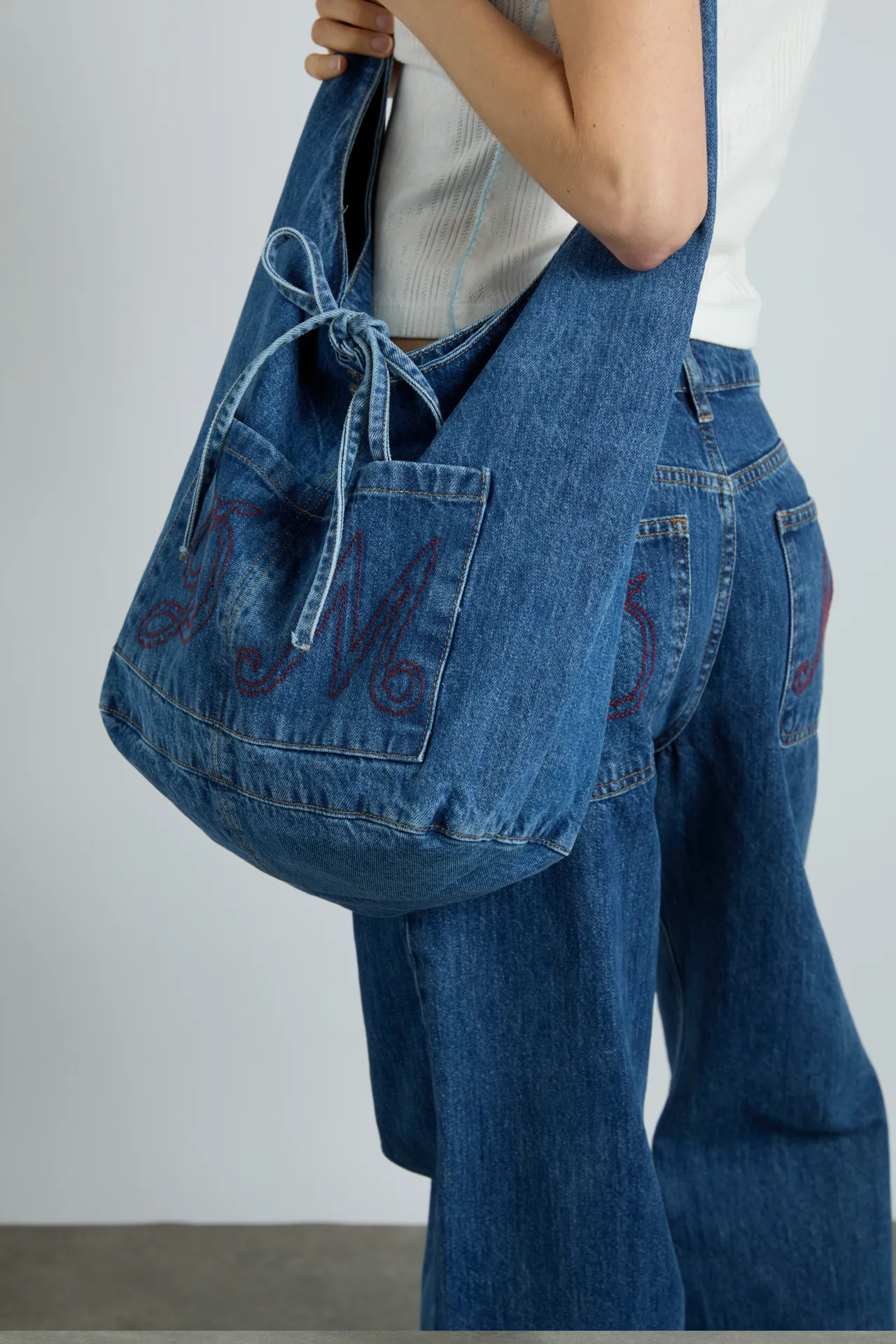 denim sling bag with pocket detail sold by Damson Madder product image thumbnail 4