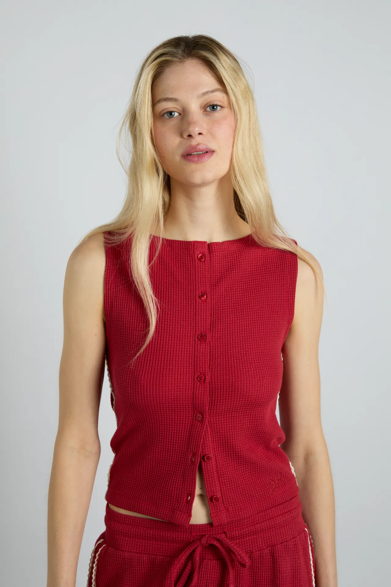 betsie waffle button tank- red sold by Damson Madder