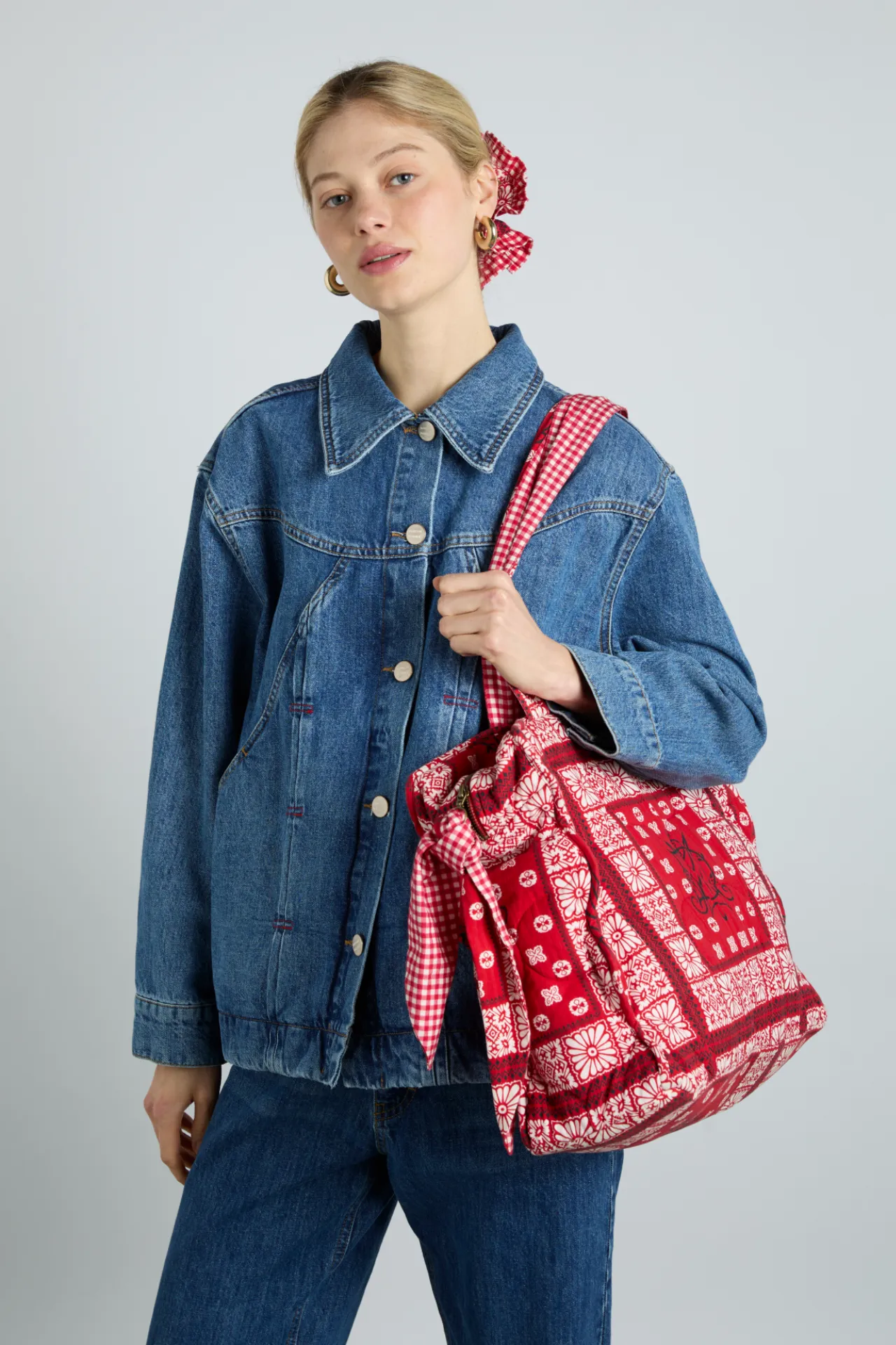 quilted tote bag in red bandana print sold by Damson Madder