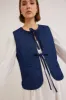 tilly gilet - denim sold by Damson Madder