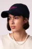 navy embroidered cap sold by Damson Madder