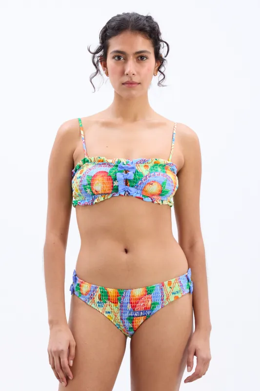 jessie shirred bow bikini top - orange fruit wrapper sold by Damson Madder