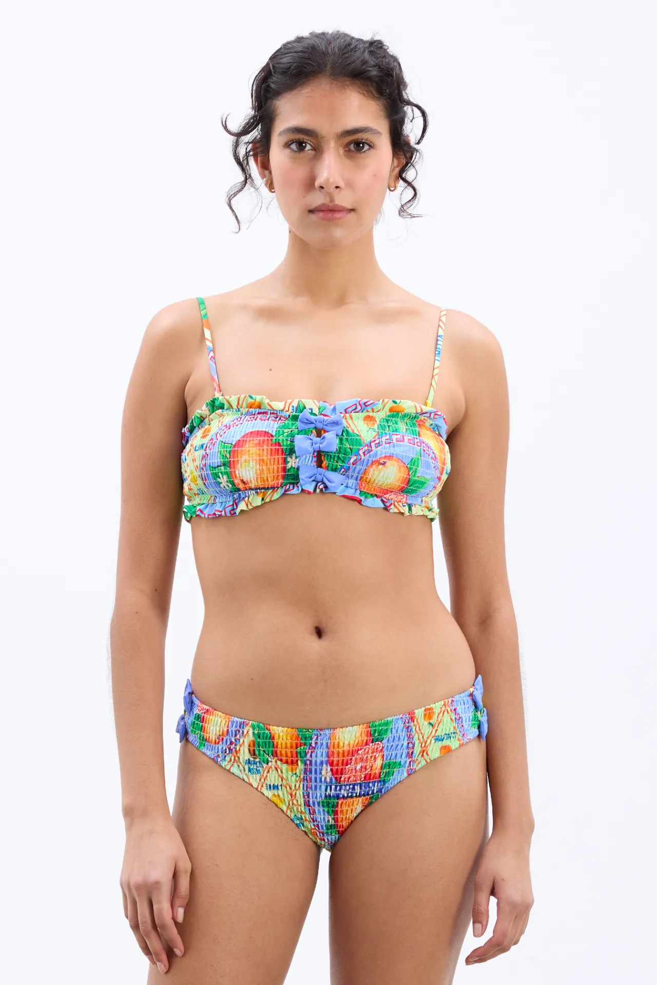 jessie shirred bow bikini top - orange fruit wrapper sold by Damson Madder