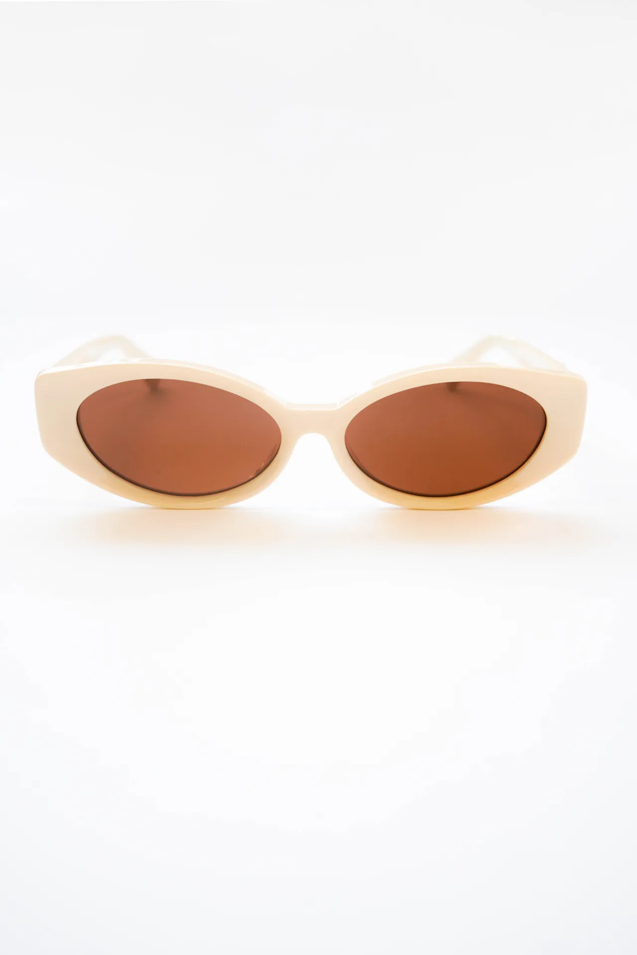 catty oval sunglasses with bow detail in bone sold by Damson Madder product image thumbnail 5