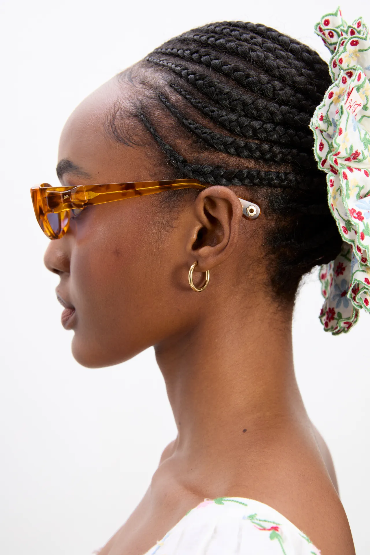 Catty Oval Sunglasses With Bow Detail In Tort sold by Damson Madder product image thumbnail 3