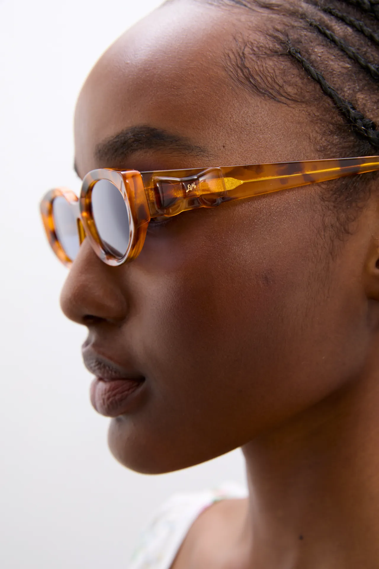 Catty Oval Sunglasses With Bow Detail In Tort sold by Damson Madder product image thumbnail 5