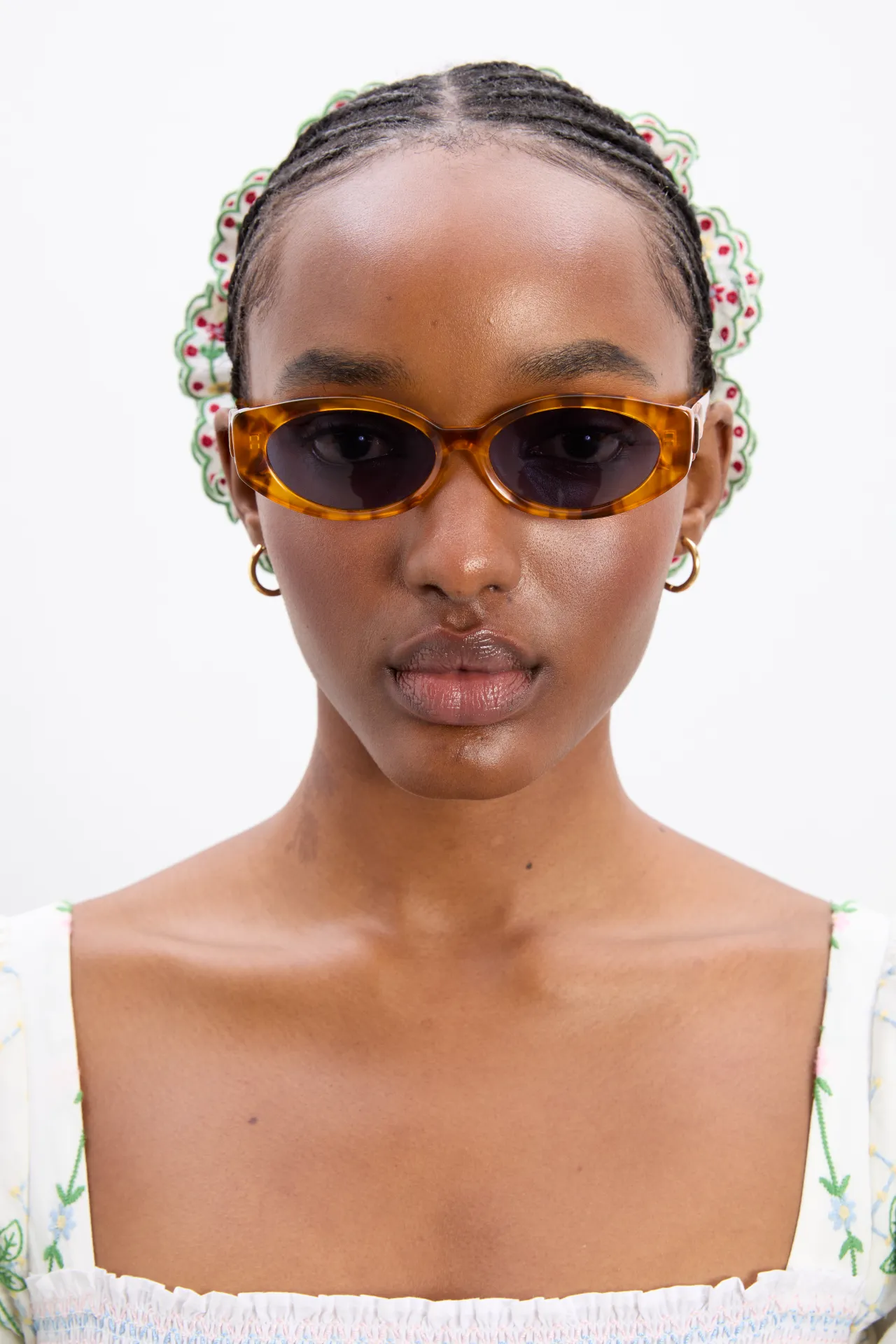 Catty Oval Sunglasses With Bow Detail In Tort sold by Damson Madder product image thumbnail 2