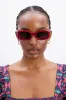 round square sunglasses with charm detail - red sold by Damson Madder