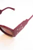 round square sunglasses with charm detail - red sold by Damson Madder