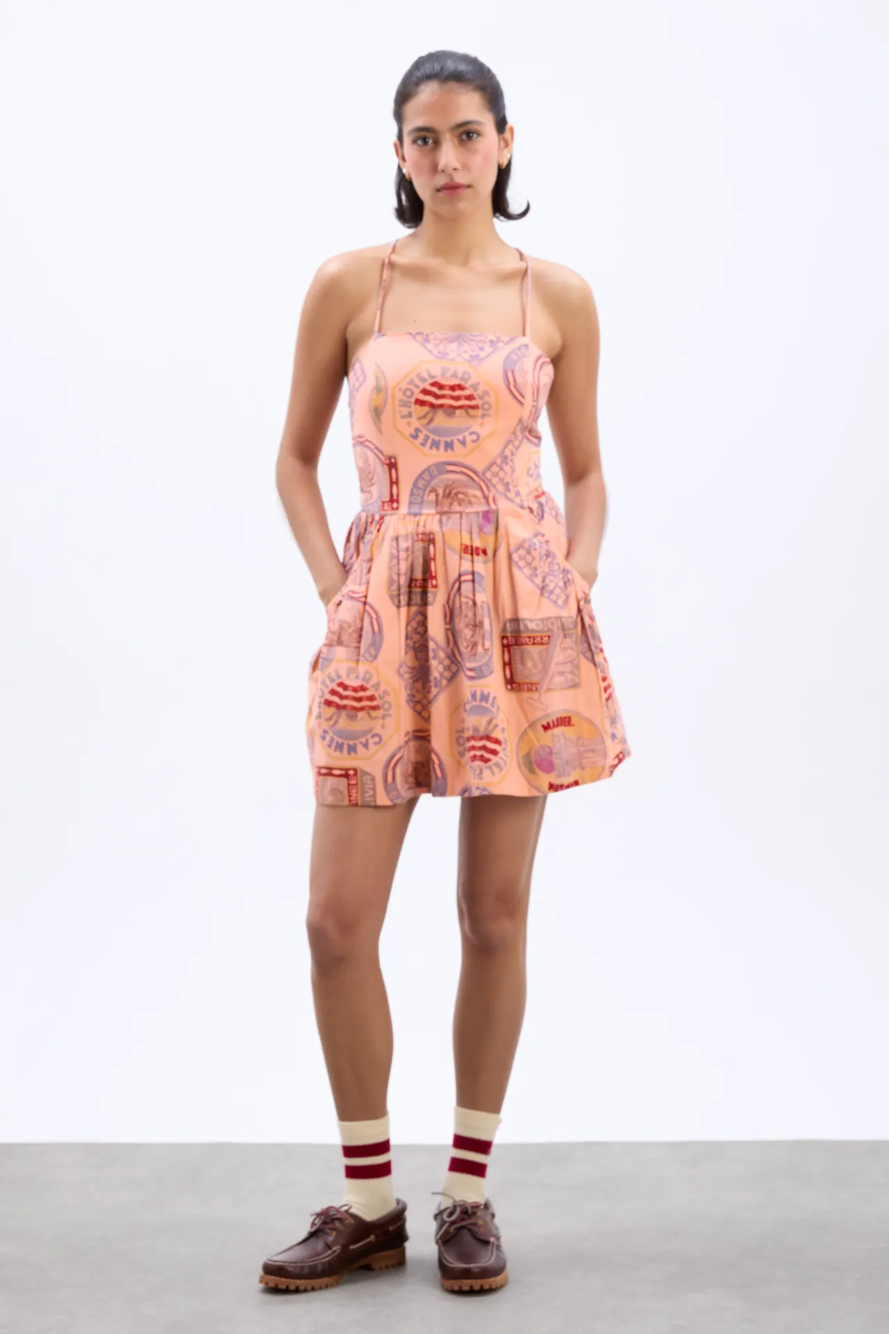 Peaches Mini Apron Dress - Papaya Holiday Print sold by Damson Madder