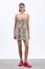 fleur shirred mini dress- orange fruit wrapper sold by Damson Madder