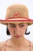 roll back raffia hat with red bow detail sold by Damson Madder